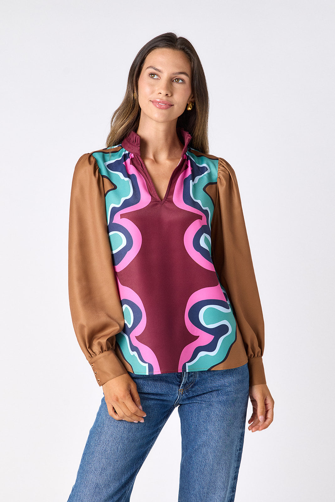 Serpentine relaxed fit long-sleeve blouse with ruffle standing collar on model – CROSBY by Mollie Burch