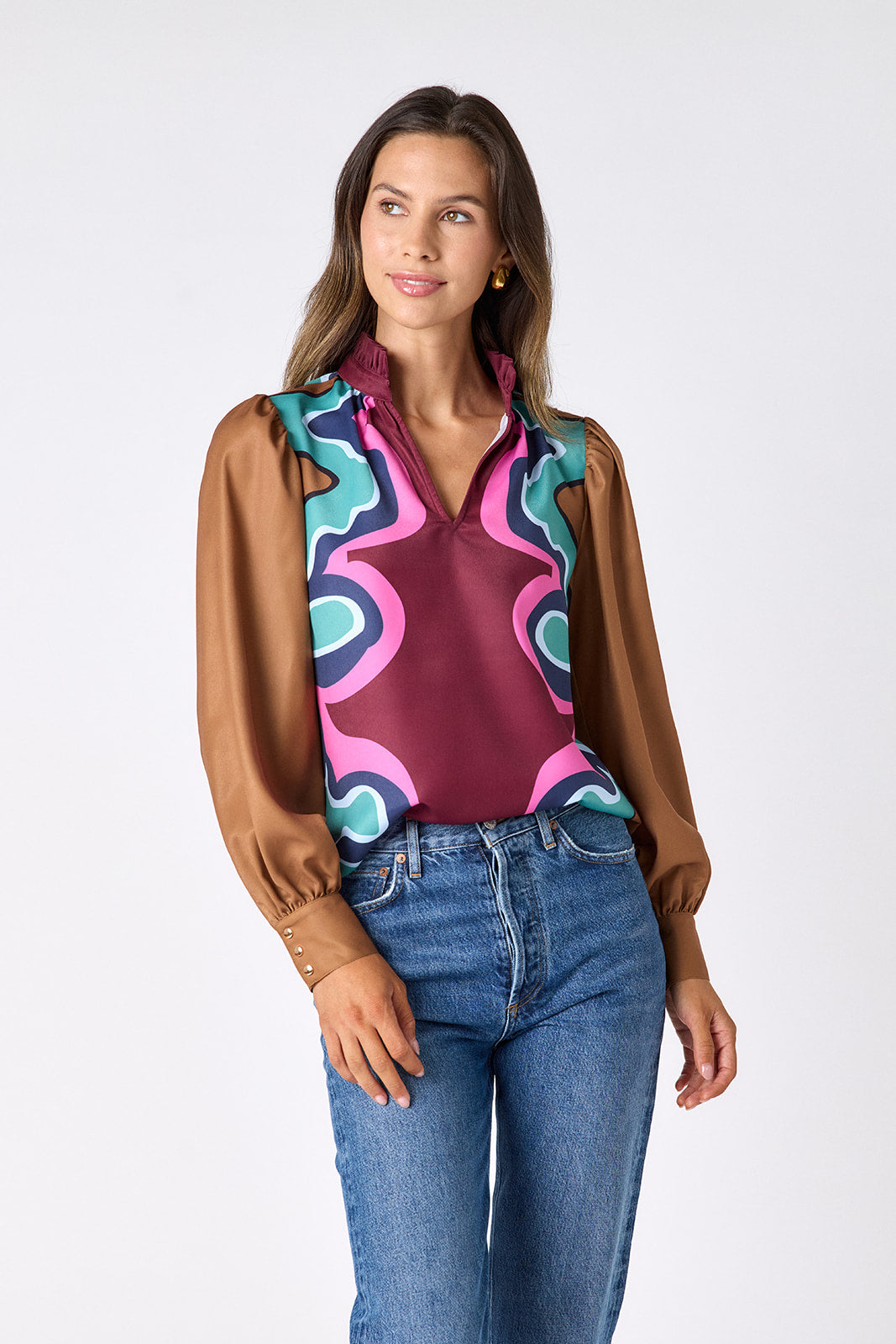 Serpentine relaxed fit long-sleeve blouse with ruffle standing collar on model – CROSBY by Mollie Burch