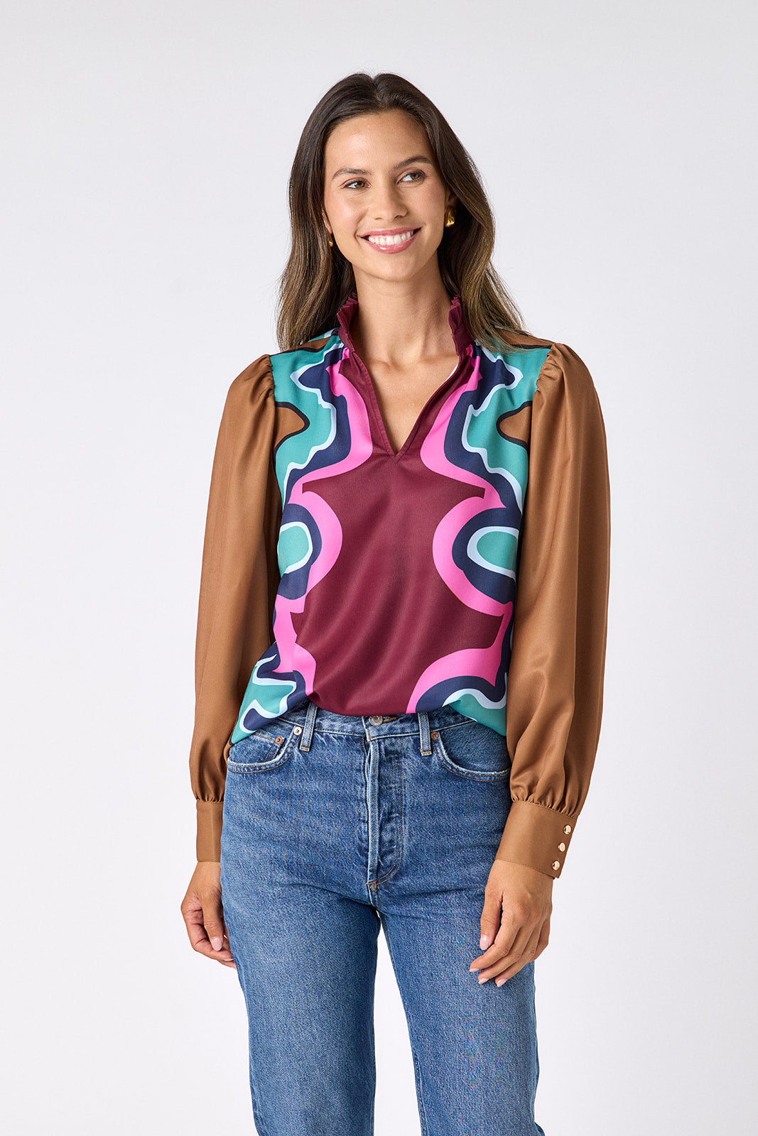 Serpentine relaxed fit long-sleeve blouse with ruffle standing collar on model – CROSBY by Mollie Burch