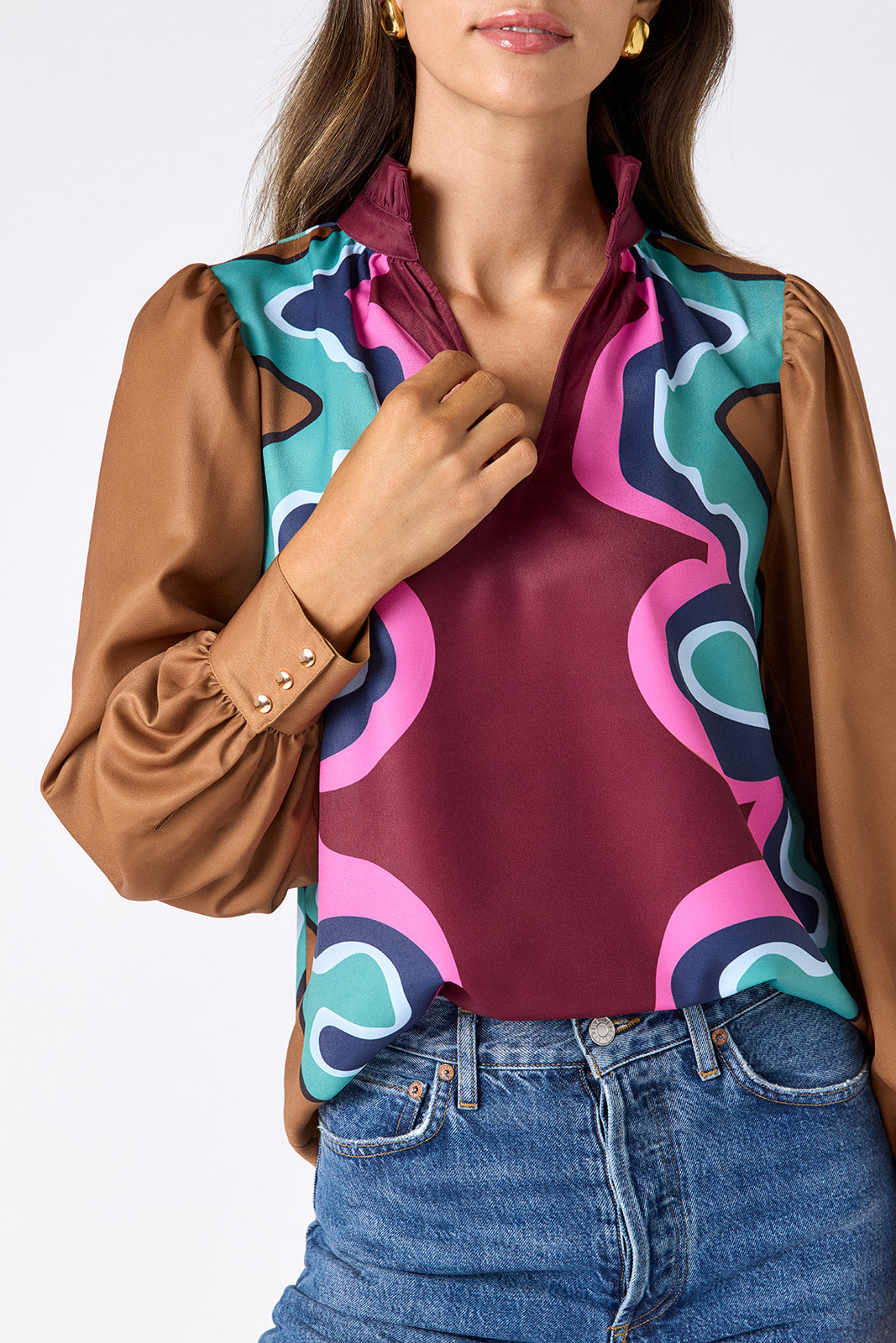 Serpentine relaxed fit long-sleeve blouse with ruffle standing collar on model – CROSBY by Mollie Burch