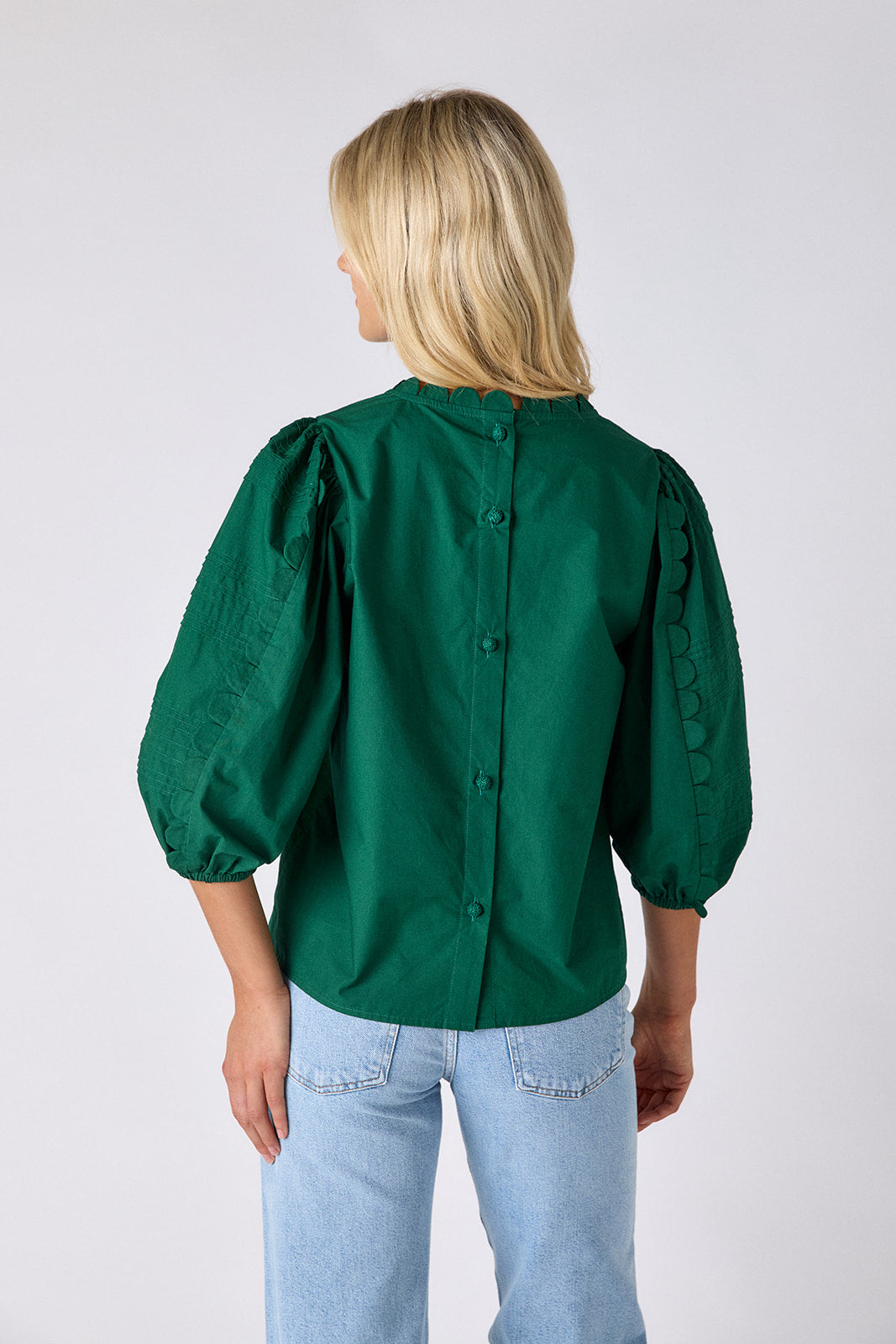 Shadow Pine top with scallop trim on model — CROSBY by Mollie Burch