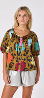 Happy Leopard button front top with balloon sleeves with Silver short on model — CROSBY by Mollie Burch