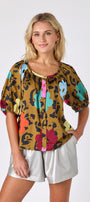 Happy Leopard button front top with balloon sleeves with Silver short on model — CROSBY by Mollie Burch