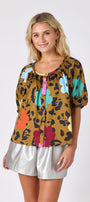 Happy Leopard button front top with balloon sleeves with Silver short on model — CROSBY by Mollie Burch