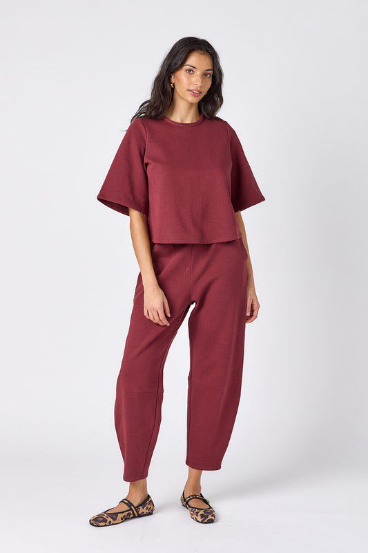 Syrah boxy cropped tee on model – CROSBY by Mollie Burch