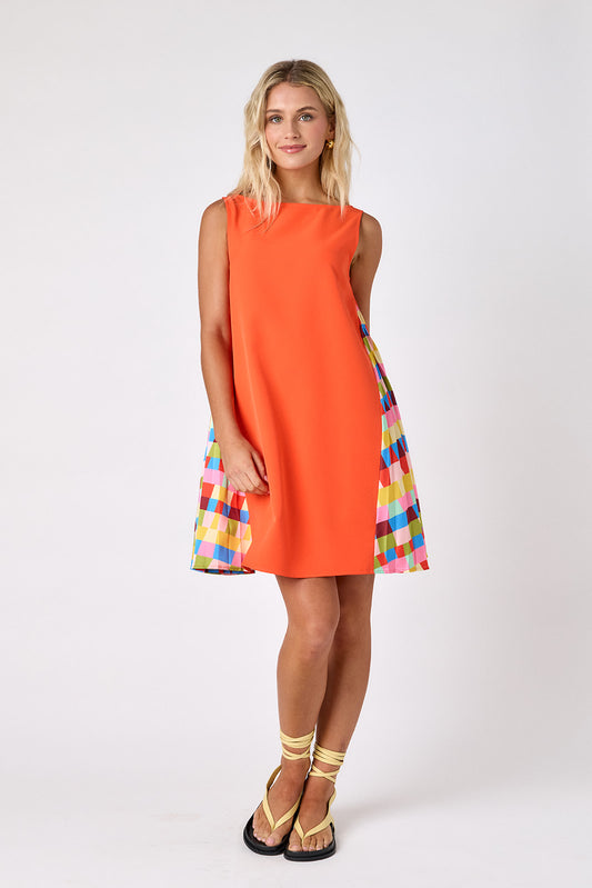 Prism tent style mini dress with side pleat detail on model — CROSBY by Mollie Burch