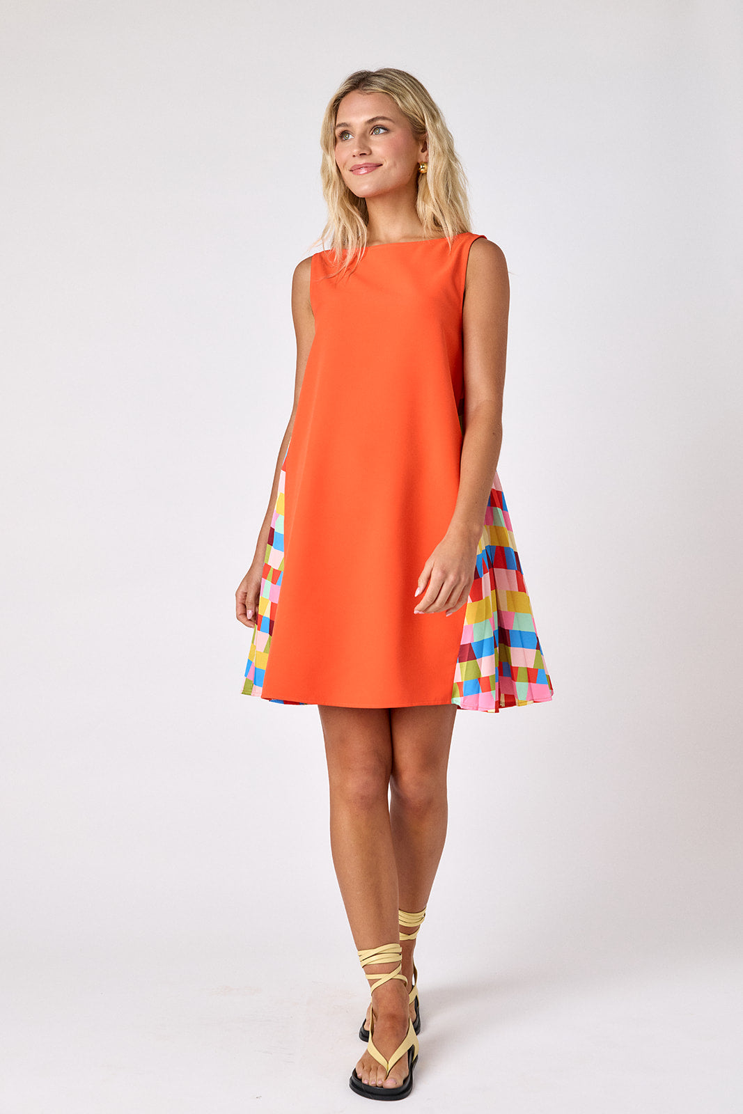 Prism tent style mini dress with side pleat detail on model — CROSBY by Mollie Burch