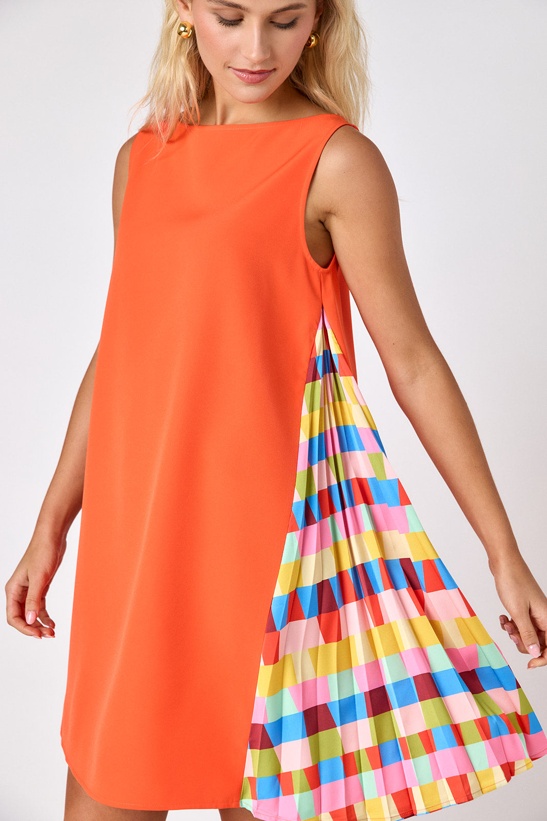 Prism tent style mini dress with side pleat detail on model — CROSBY by Mollie Burch