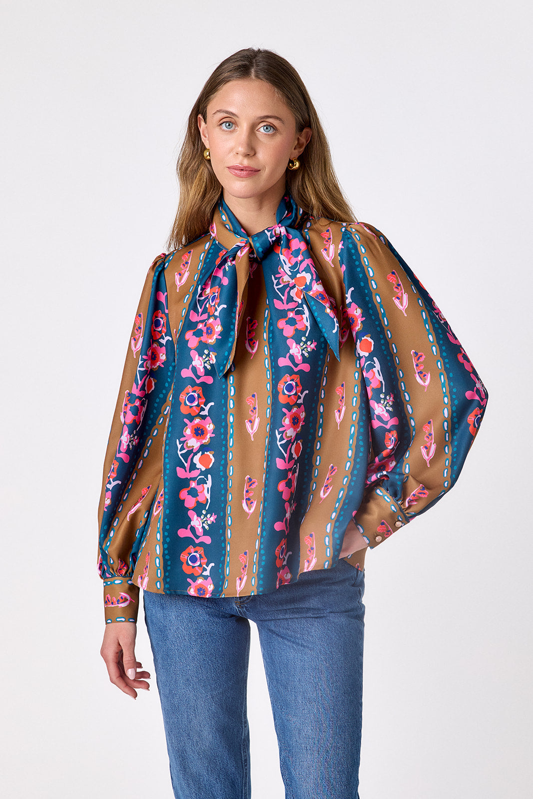 Tapestry Stripe flowy long-sleeve top with tie neck detail on model – CROSBY by Mollie Burch