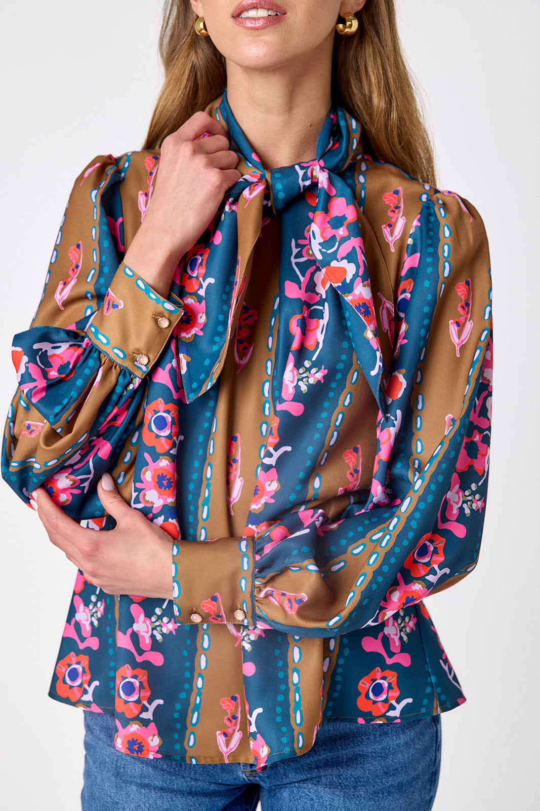 Tapestry Stripe flowy long-sleeve top with tie neck detail on model – CROSBY by Mollie Burch