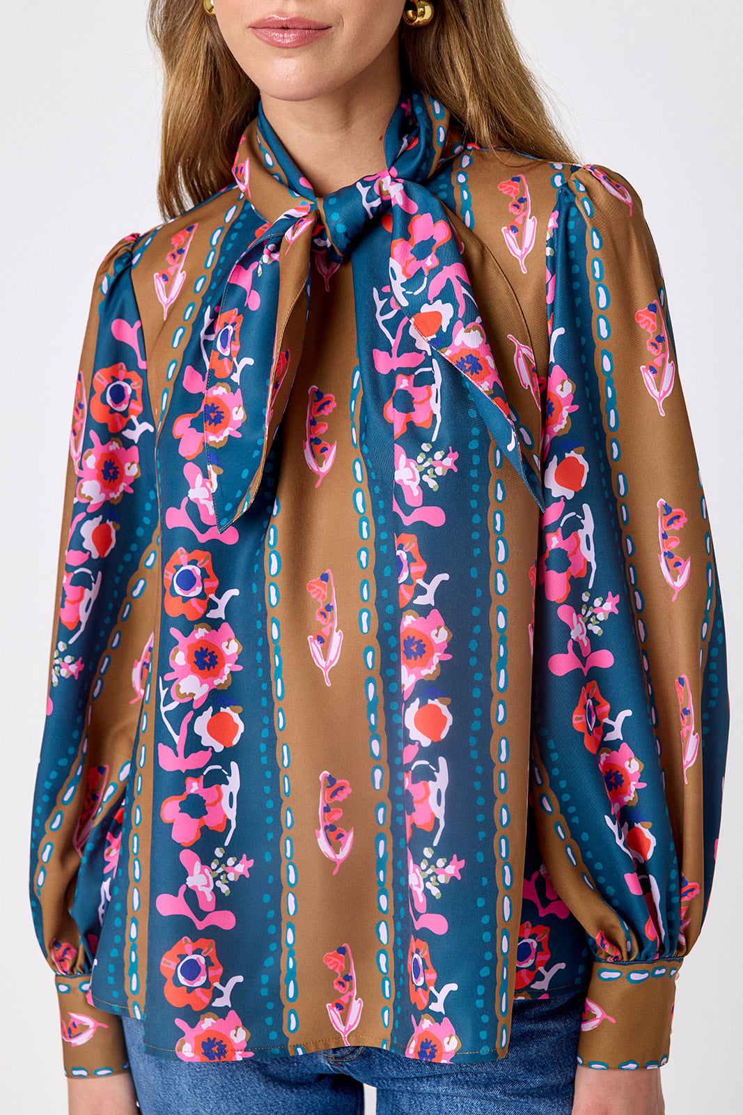Tapestry Stripe flowy long-sleeve top with tie neck detail on model – CROSBY by Mollie Burch