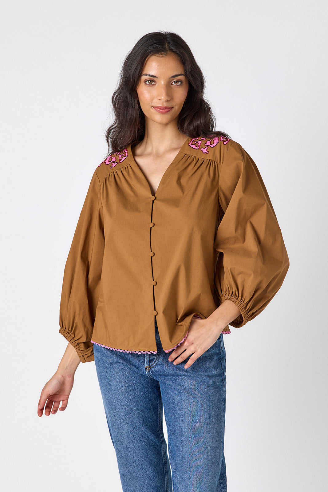 Teak button-front v-neck blouse with voluminous sleeve on model – CROSBY by Mollie Burch