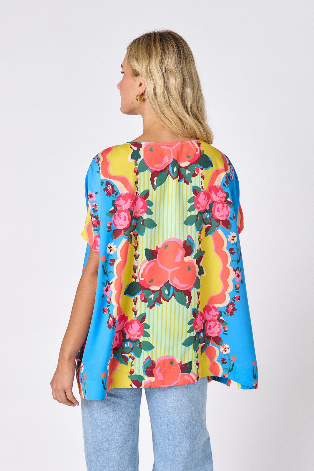The Grove oversized short sleeve tunic on model — CROSBY by Mollie Burch