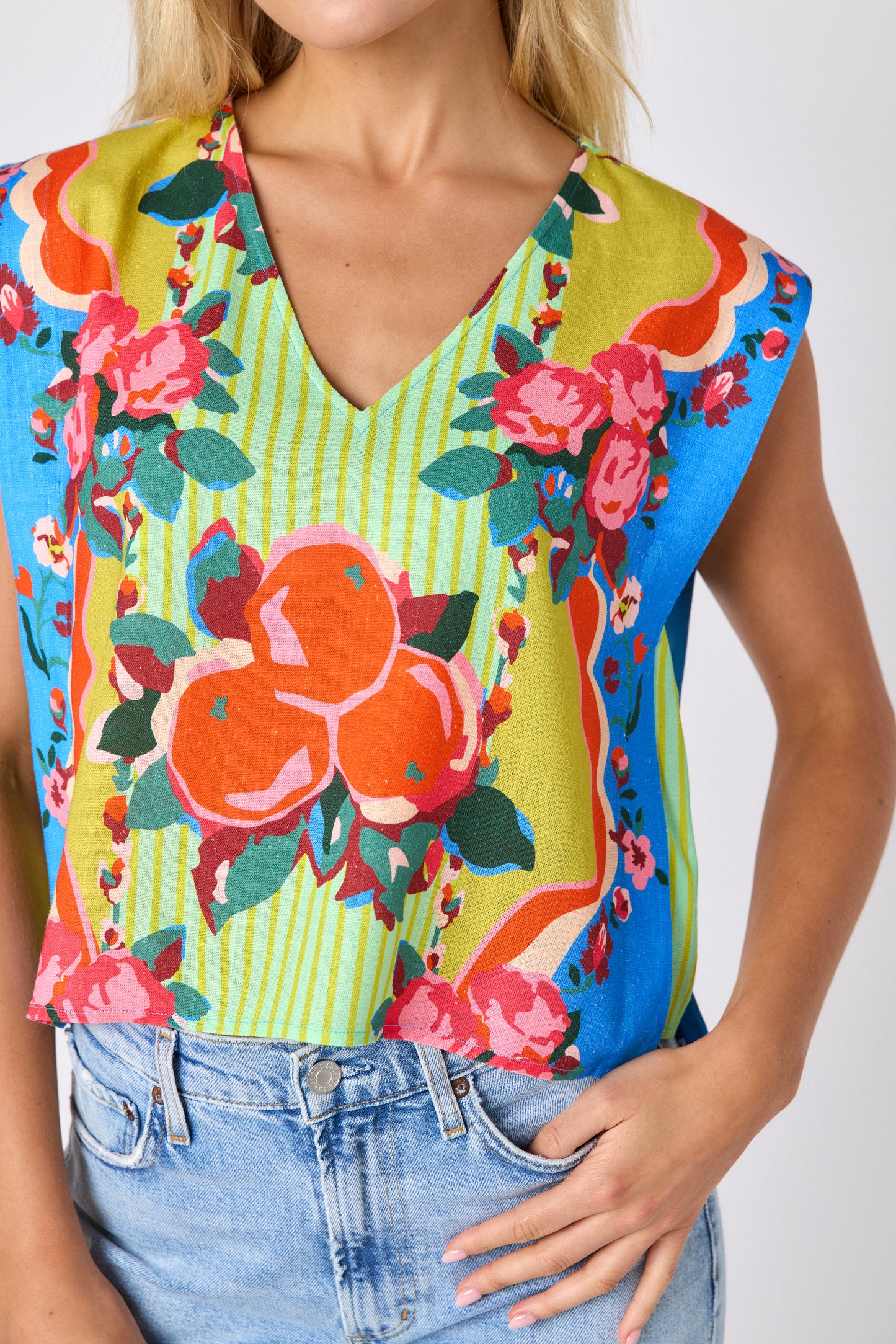The Grove crop-length tank top with v-neck on model — CROSBY by Mollie Burch