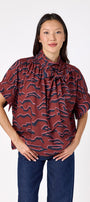 Lillian Top with short sleeves and versatile scarf detailing on model – CROSBY by Mollie Burch