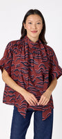 Lillian Top with short sleeves and versatile scarf detailing on model – CROSBY by Mollie Burch