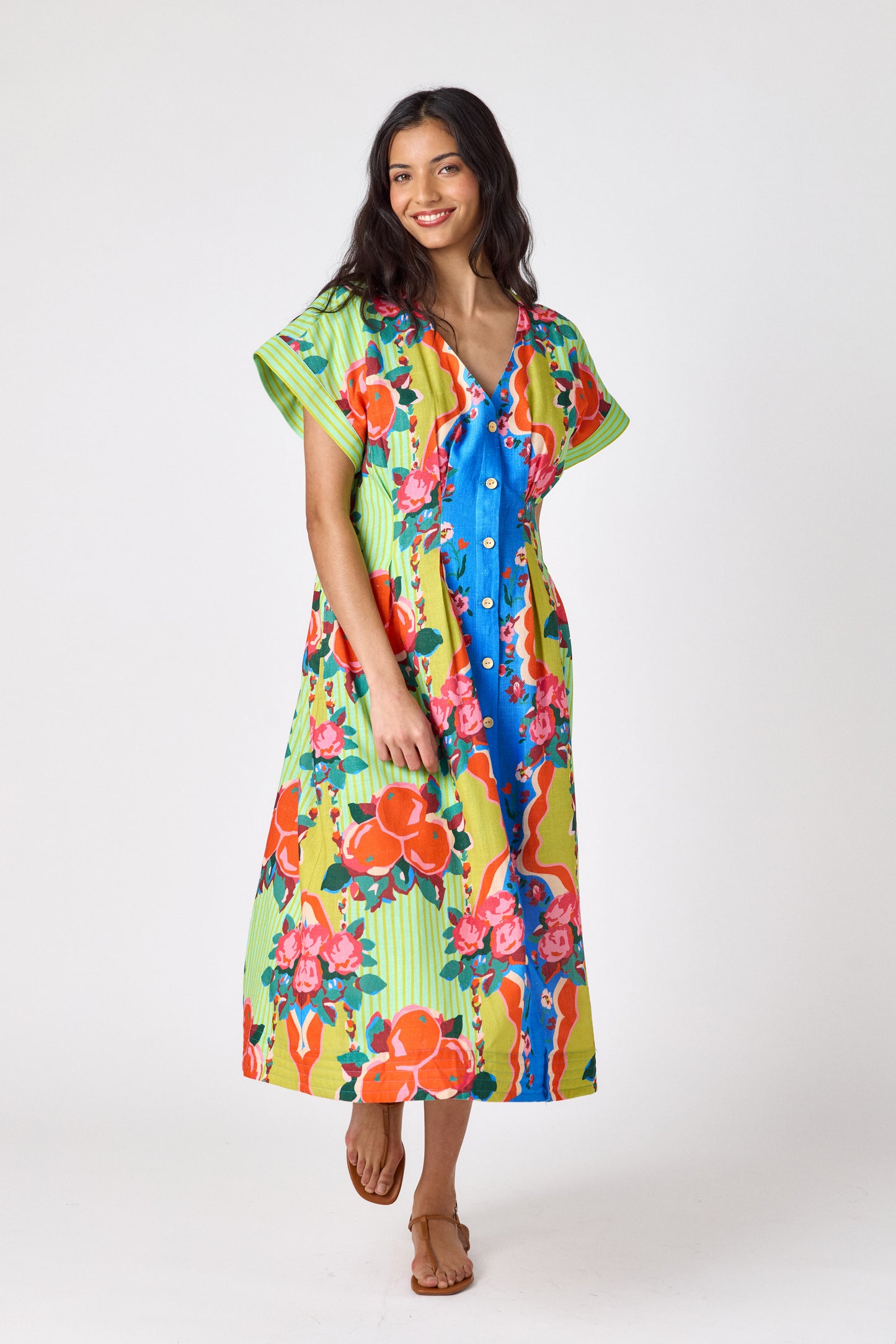The Grove short sleeved button-front midi dress with waist emphasis on model — CROSBY by Mollie Burch