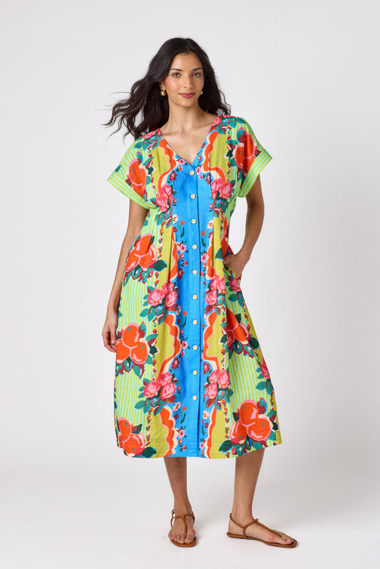 The Grove short sleeved button-front midi dress with waist emphasis on model — CROSBY by Mollie Burch