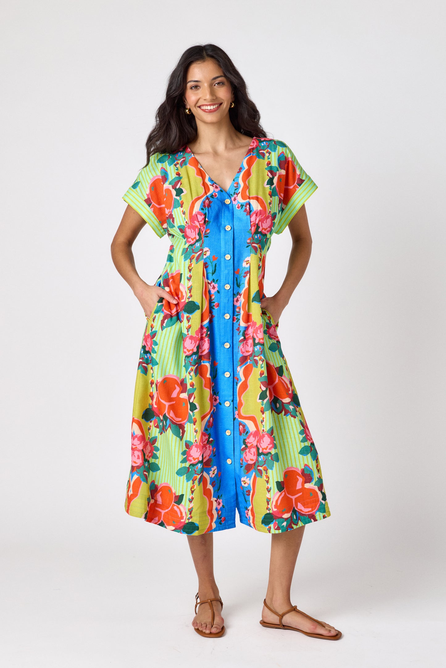 The Grove short sleeved button-front midi dress with waist emphasis on model — CROSBY by Mollie Burch