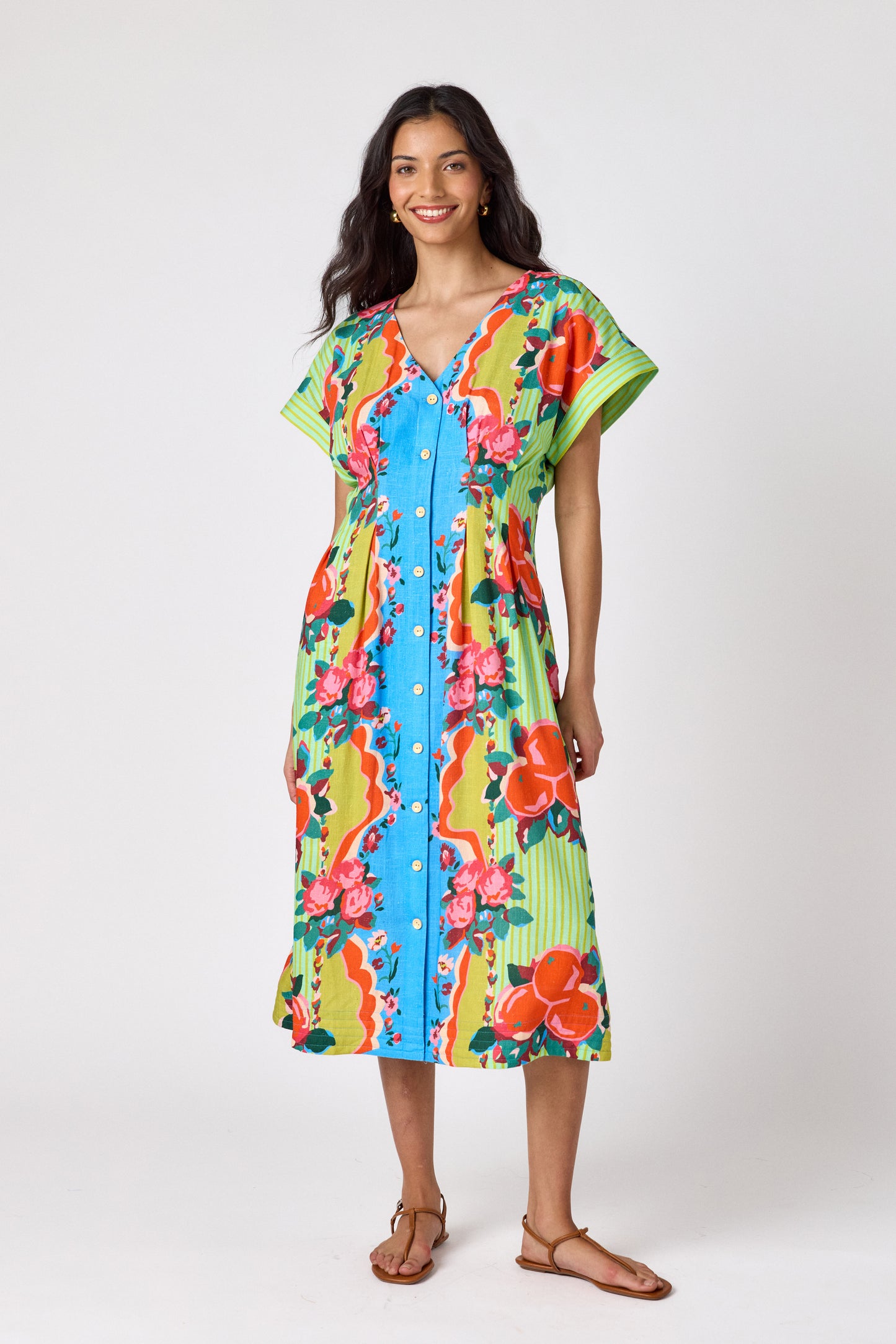 The Grove short sleeved button-front midi dress with waist emphasis on model — CROSBY by Mollie Burch