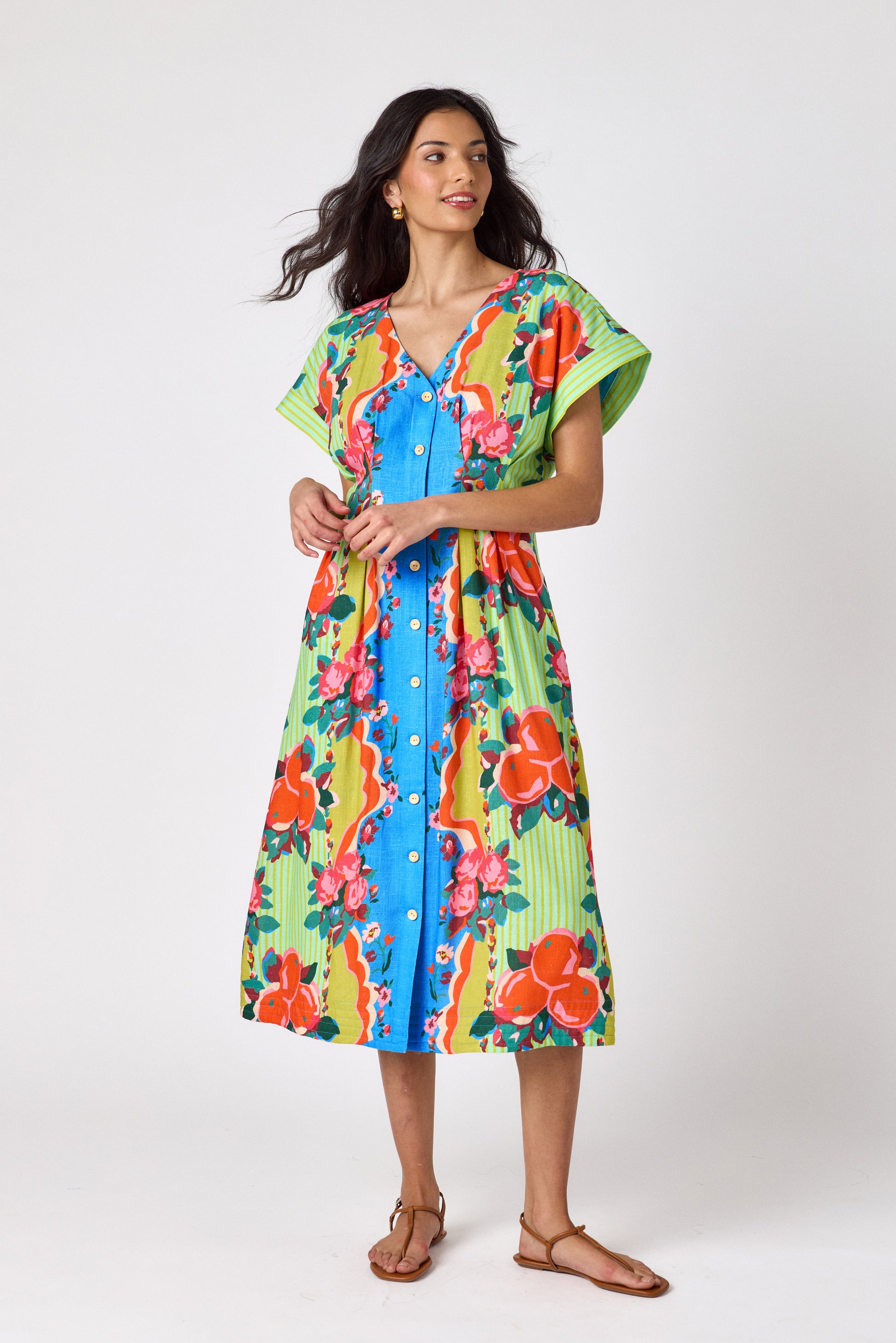 The Grove short sleeved button-front midi dress with waist emphasis on model — CROSBY by Mollie Burch