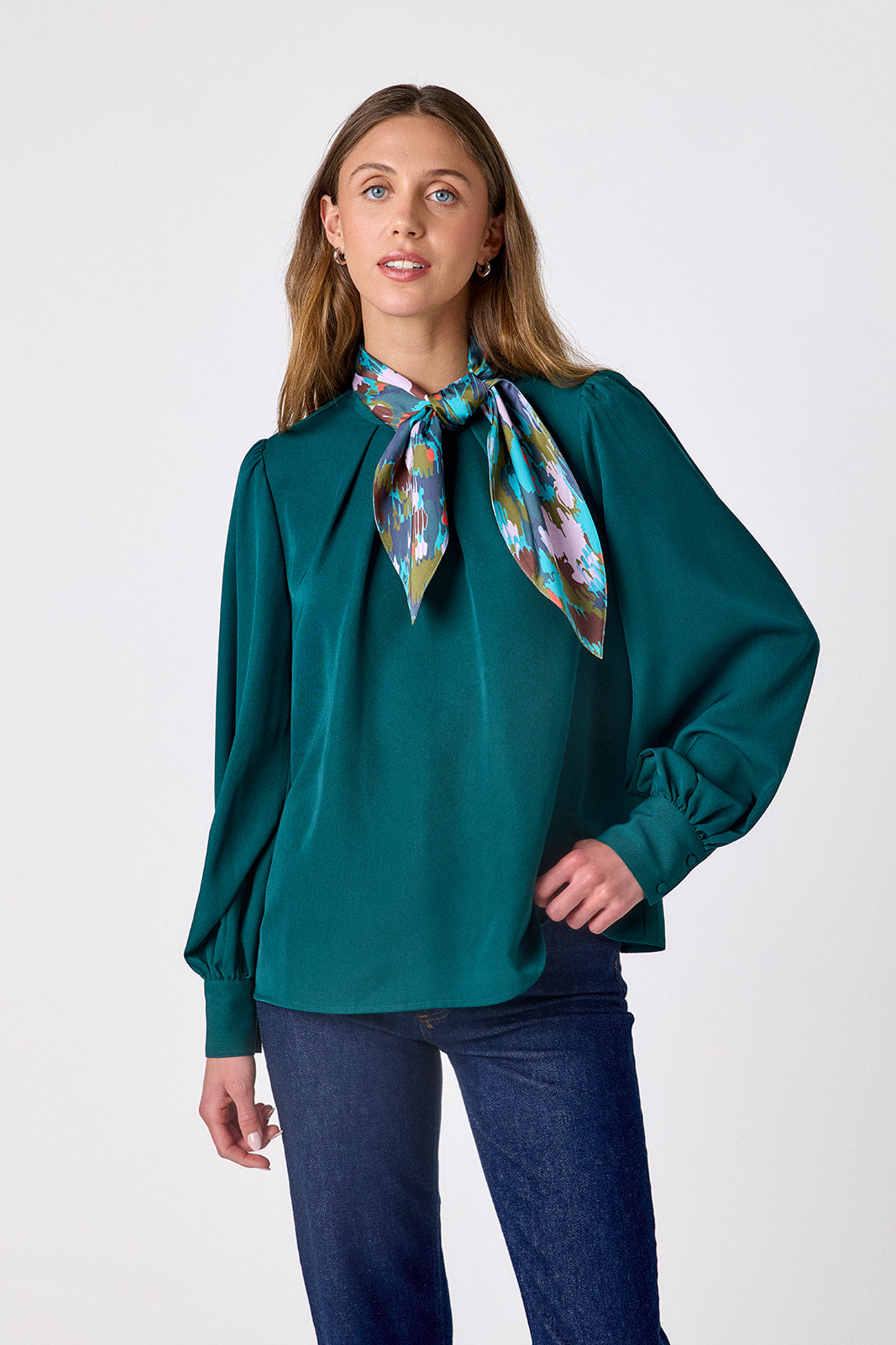  Verdigris flowy long-sleeve top with tie neck detail on model – CROSBY by Mollie Burch