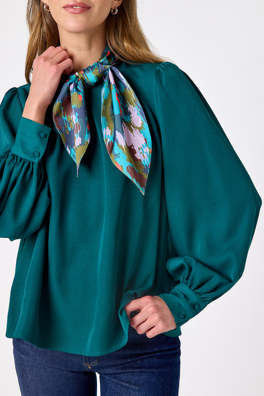  Verdigris flowy long-sleeve top with tie neck detail on model – CROSBY by Mollie Burch