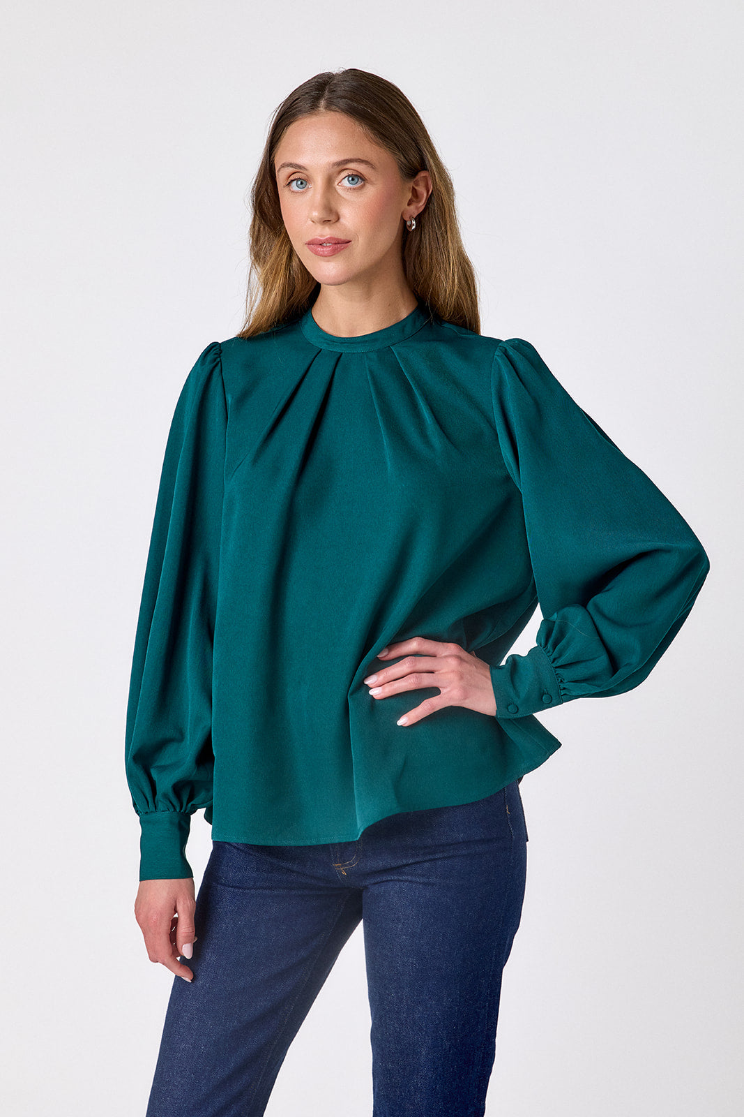  Verdigris flowy long-sleeve top with tie neck detail on model – CROSBY by Mollie Burch