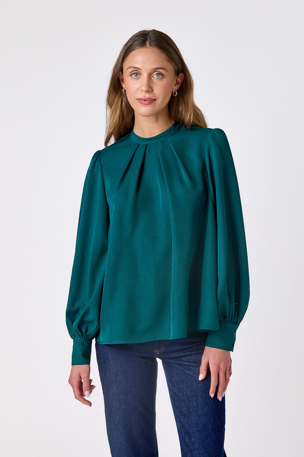  Verdigris flowy long-sleeve top with tie neck detail on model – CROSBY by Mollie Burch