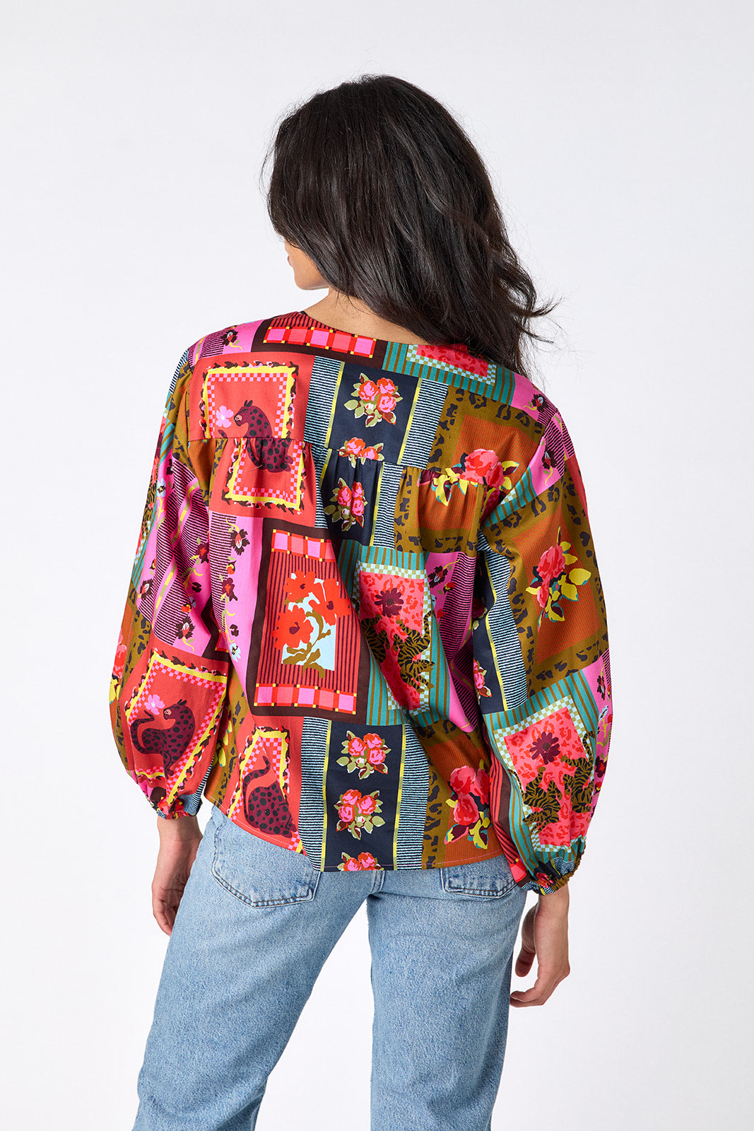 Vintage Vignette button-front v-neck blouse with voluminous sleeve on model – CROSBY by Mollie Burch