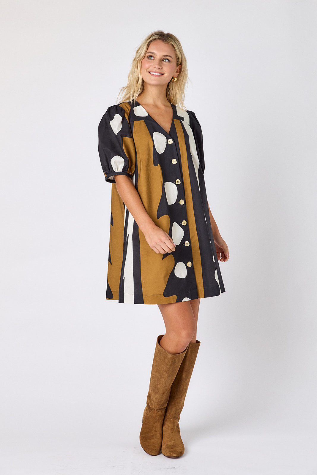 Wild Line v-neck dress with puff sleeves and a swingy silhouette on model — CROSBY by Mollie Burch
