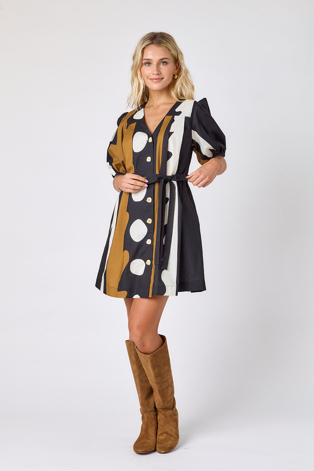 Wild Line v-neck dress with puff sleeves and a swingy silhouette on model — CROSBY by Mollie Burch