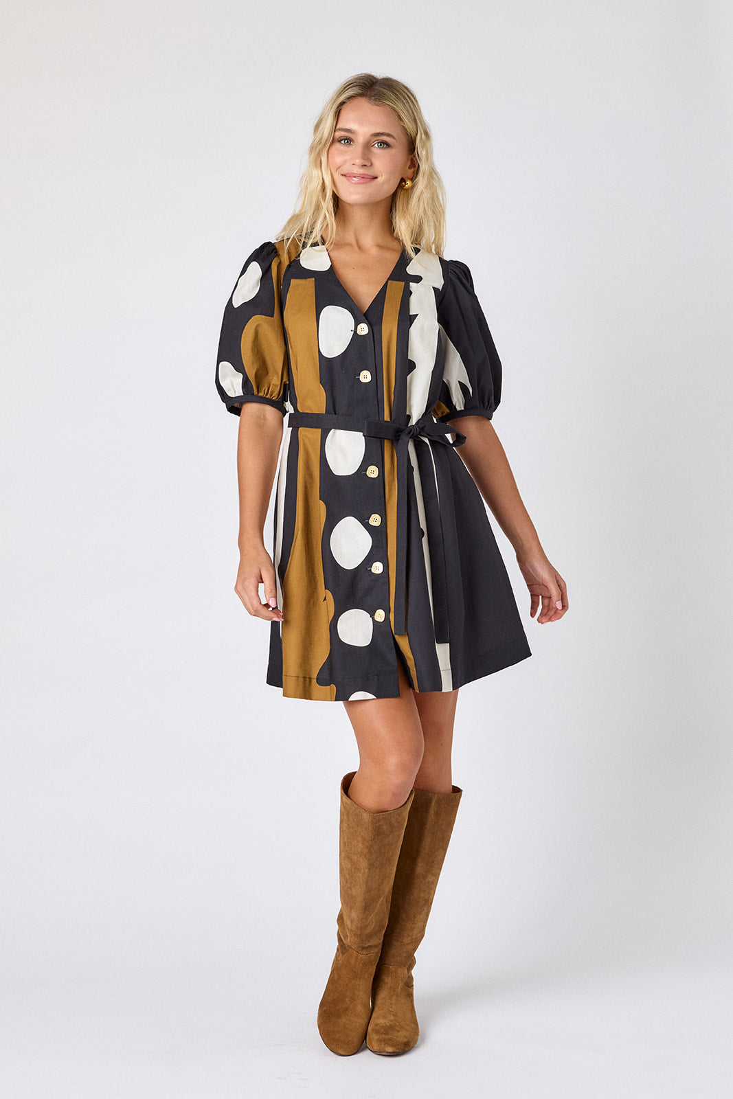 Wild Line v-neck dress with puff sleeves and a swingy silhouette on model — CROSBY by Mollie Burch