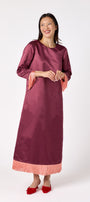 Drewry Dress in Wine featuring satin fabric and contrast fringe trim on model – CROSBY by Mollie Burch