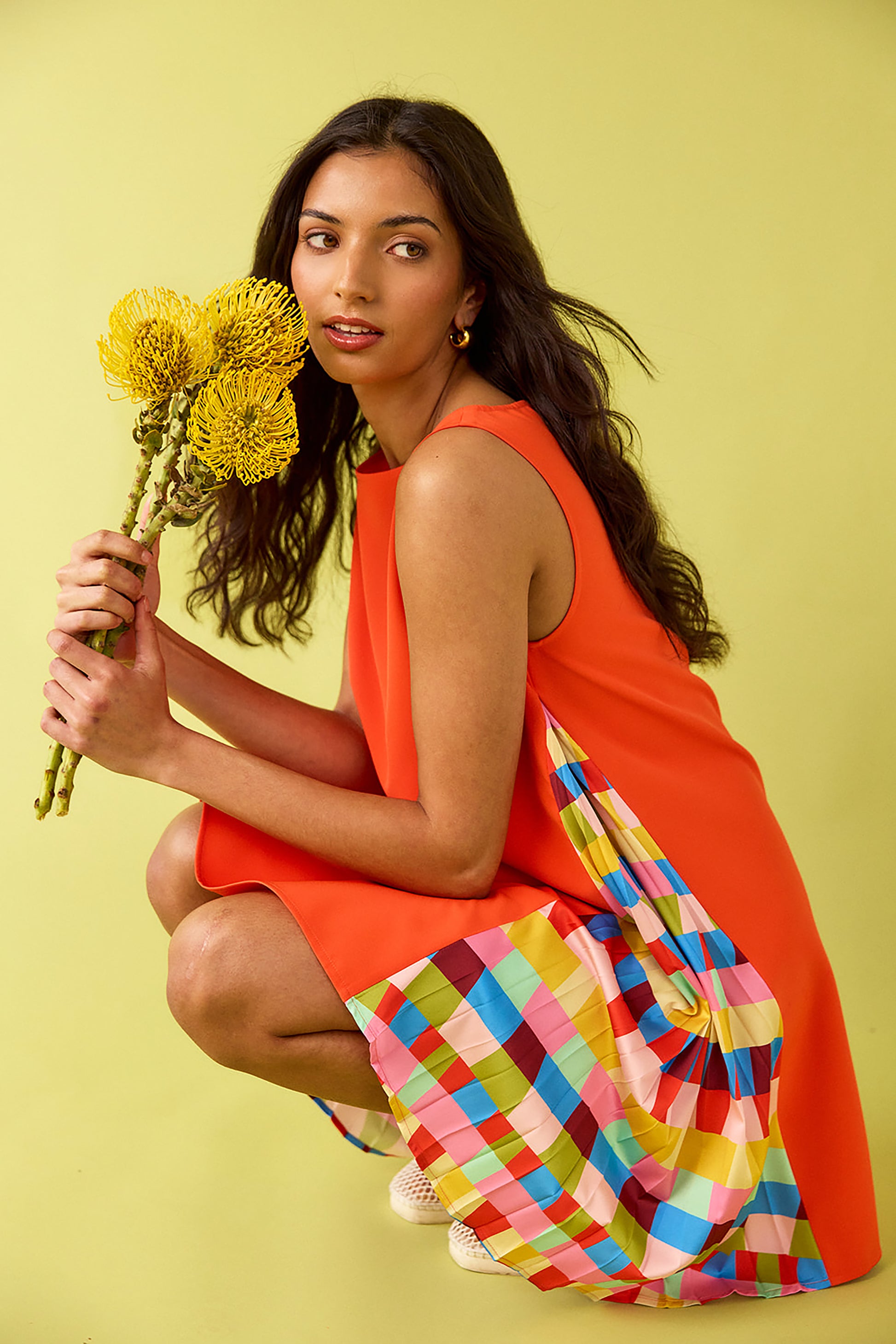 Prism tent style mini dress with side pleat detail on model — CROSBY by Mollie Burch