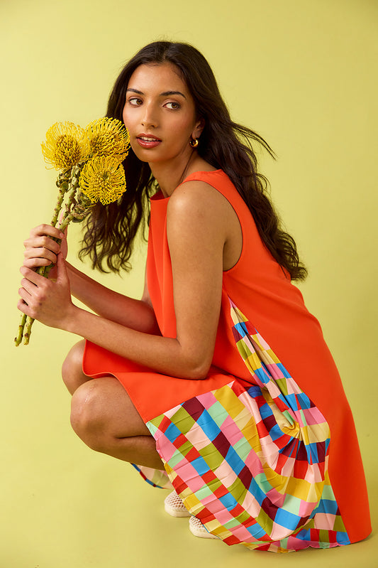 Prism tent style mini dress with side pleat detail on model — CROSBY by Mollie Burch